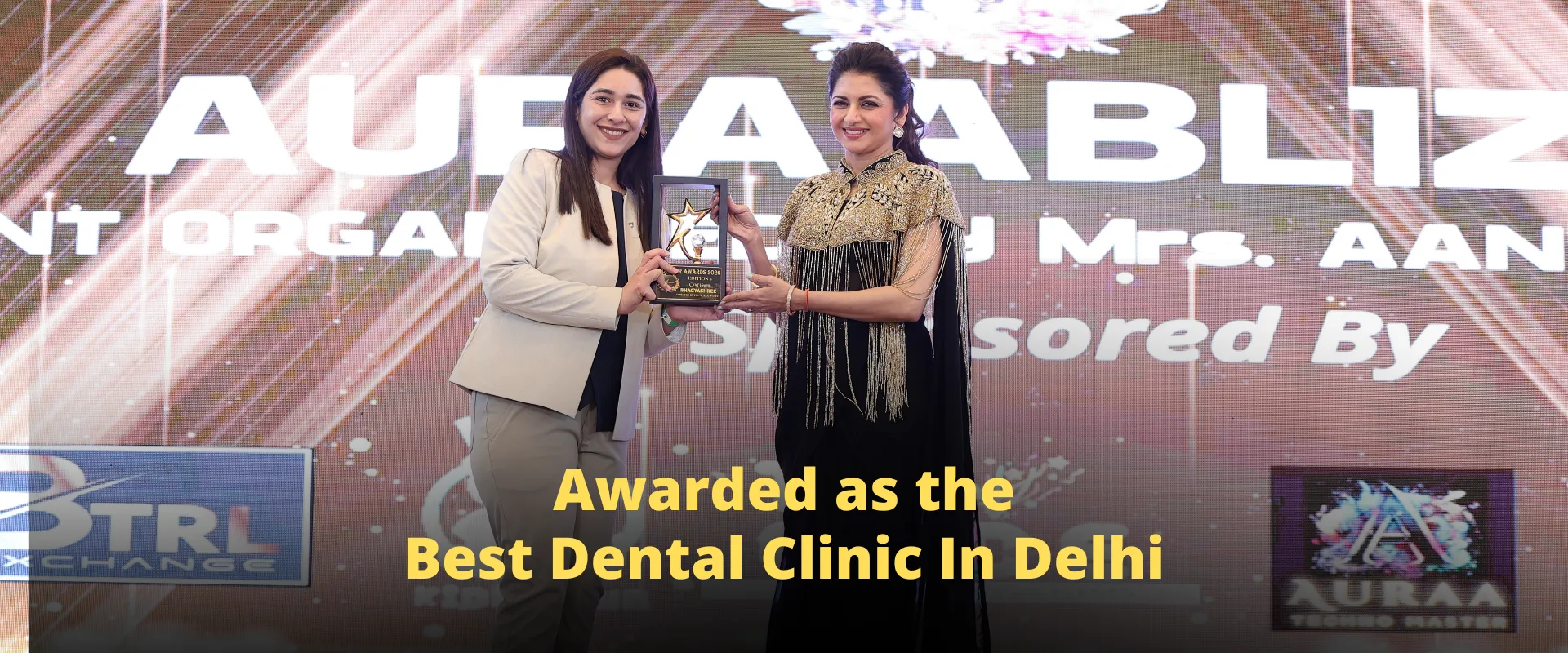 Dr. Prerna receiving an award